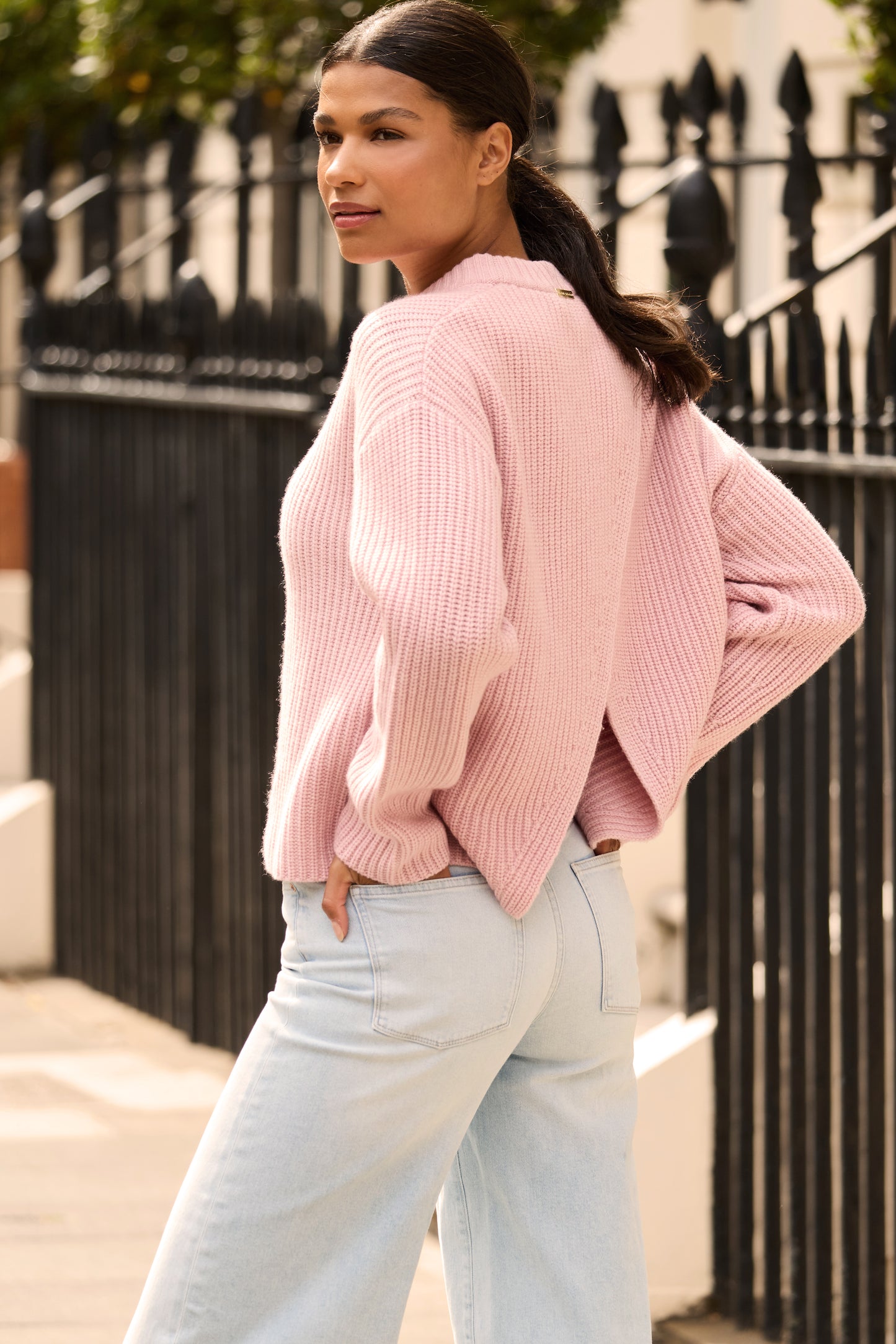 Pink open back crew neck jumper made from merino wool and cashmere