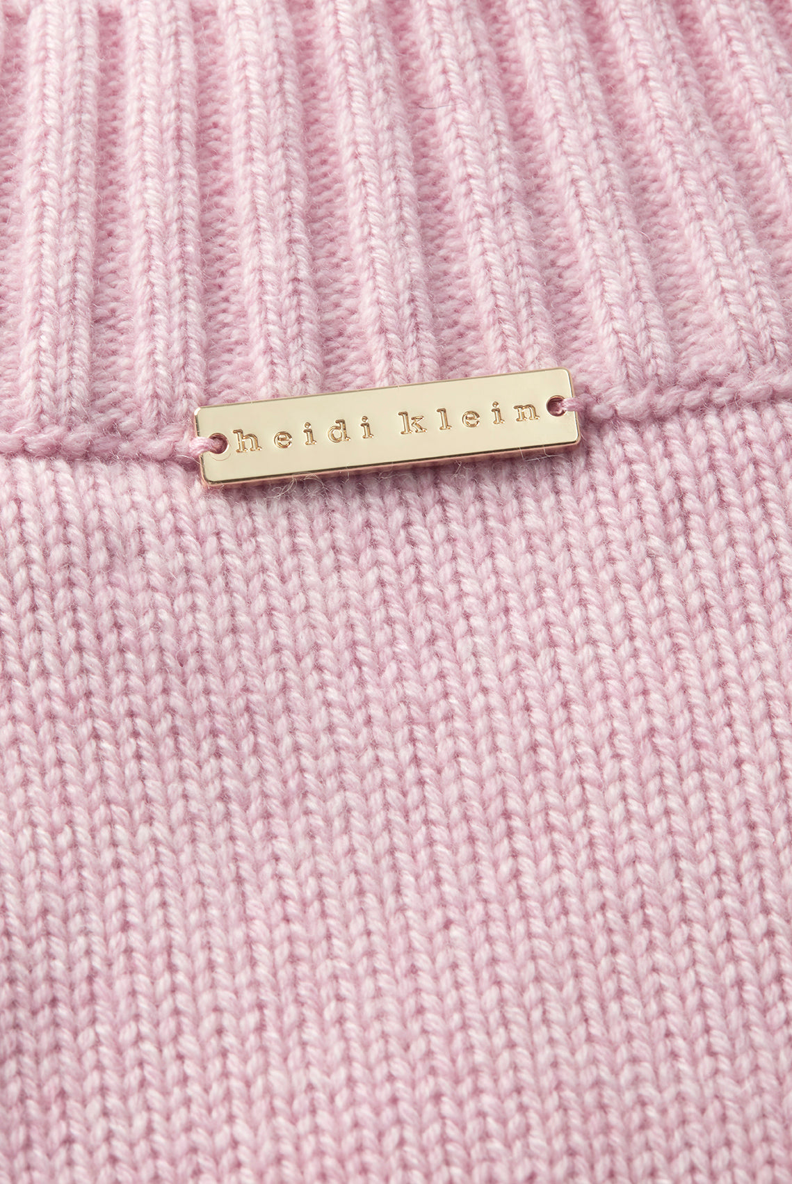 Pink V neck jumper made from merino wool and cashmere