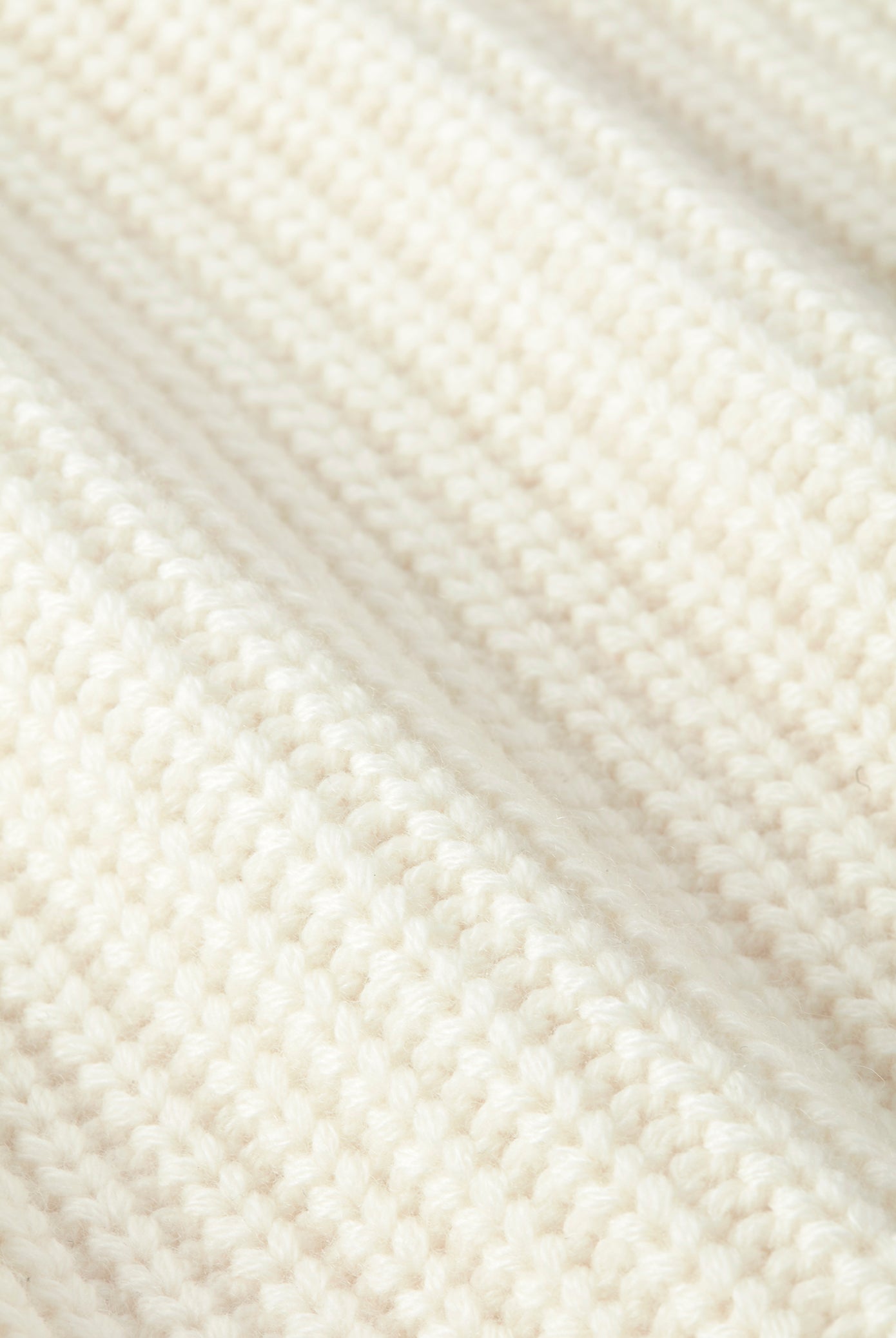 Cream open back crew neck jumper made from merino wool and cashmere